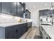 Modern kitchen with stainless steel appliances and white quartz countertops at 1056 Moorhen Ct., Conway, SC 29526