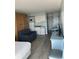 Open floor plan with kitchen, sofa, and dining area at 1207 S Ocean Blvd. # 20205, Myrtle Beach, SC 29577