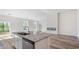 Beautiful kitchen featuring granite countertops and stainless steel appliances overlooking an open-concept living area at 123 Tbd Sun Colony Blvd., Longs, SC 29568