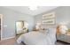 A charming bedroom with a comfortable bed, neutral decor, and plenty of natural light from the window at 124 Tbd Sun Colony Blvd., Longs, SC 29568