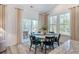 Sunlit dining area with sliding glass doors to an outdoor patio at 124 Tbd Sun Colony Blvd., Longs, SC 29568