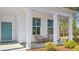 Inviting front porch features comfortable seating and stylish decor at 124 Tbd Sun Colony Blvd., Longs, SC 29568
