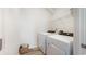 This laundry room features a washer and dryer, as well as storage shelves for convenience at 124 Tbd Sun Colony Blvd., Longs, SC 29568