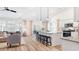 Open-concept living area with a view of the kitchen and backyard at 124 Tbd Sun Colony Blvd., Longs, SC 29568