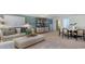 A spacious living room with an ottoman and storage at 124 Tbd Sun Colony Blvd., Longs, SC 29568