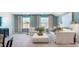 A spacious room with beautiful couches, decor pillows, and outside lighting at 124 Tbd Sun Colony Blvd., Longs, SC 29568