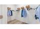 Organized walk-in closet with ample hanging space, shelving, and a clean, minimalist design at 124 Tbd Sun Colony Blvd., Longs, SC 29568
