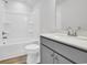 Bathroom featuring modern vanity, mirror, and bathtub at 132 Joyce Dr, Longs, SC 29568