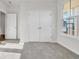 Bedroom with a window and a set of double doors at 132 Joyce Dr, Longs, SC 29568