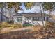 House exterior with front porch and landscaping at 134 Manor Circle, Myrtle Beach, SC 29588