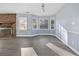 Sunlit living room with bay window and fireplace at 134 Manor Circle, Myrtle Beach, SC 29588