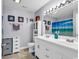 Clean bathroom with double vanity and a beach-themed shower curtain at 1501 Saint George Ln., Myrtle Beach, SC 29588