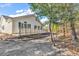 House exterior showcasing backyard and wooded area at 1501 Saint George Ln., Myrtle Beach, SC 29588