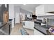 Clean and functional kitchen with white cabinets and dark counters at 1501 Saint George Ln., Myrtle Beach, SC 29588