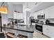 Modern kitchen with stainless steel appliances and dark counters at 1501 Saint George Ln., Myrtle Beach, SC 29588