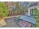 Private patio with brick pathway and wooded backyard at 1501 Saint George Ln., Myrtle Beach, SC 29588