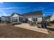 Backyard patio area perfect for outdoor gatherings and enjoying the expansive lawn at 1829 Wood Stork Dr., Conway, SC 29526