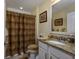 This bathroom has a vanity with granite countertops and a shower/tub combo at 1829 Wood Stork Dr., Conway, SC 29526