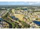 Aerial view of a luxury golf course community with serene lakes at 1832 Hardwood Ct., Conway, SC 29526