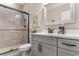 Modern bathroom with a walk-in shower, gray vanity, and plenty of counter space at 1853 Wood Stork Dr., Conway, SC 29526