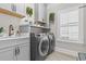 Convenient laundry room with washer, dryer, and cabinets at 1853 Wood Stork Dr., Conway, SC 29526