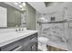 Modern bathroom with a large shower and marble tile at 203 Heron Marsh Dr. # 78, Pawleys Island, SC 29585