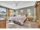 Main bedroom with a king bed and stylish decor at 203 Heron Marsh Dr. # 78, Pawleys Island, SC 29585
