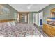 Spacious Primary bedroom with king-size bed and private access to bathroom at 203 Heron Marsh Dr. # 78, Pawleys Island, SC 29585