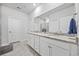 Bathroom featuring double sinks with modern fixtures and granite countertops at 2602 Blue Crane Circle # 101, Myrtle Beach, SC 29577