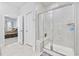 Modern bathroom with a tiled walk-in shower with built in bench at 2602 Blue Crane Circle # 101, Myrtle Beach, SC 29577