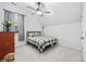 Bedroom with a ceiling fan, lots of natural light, and carpet floors at 2602 Blue Crane Circle # 101, Myrtle Beach, SC 29577