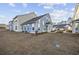 Charming two-story home features a blue exterior with white trim and a well-maintained lawn at 2602 Blue Crane Circle # 101, Myrtle Beach, SC 29577