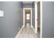 Bright hallway leading to a room with natural light from the window at 261 Marsh Tacky Loop, Myrtle Beach, SC 29588