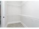 Spacious walk-in closet with white wire shelving to maximize storage and organization at 261 Marsh Tacky Loop, Myrtle Beach, SC 29588