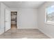 Bedroom with grey flooring, a window, and a view of the kitchen at 3555 Highway 544 # 2C, Conway, SC 29526