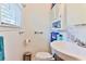 A small bathroom with a toilet, sink, and shower at 3657 Highway 472, Conway, SC 29526