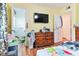 Bedroom with dresser, tv, and bathroom access at 3657 Highway 472, Conway, SC 29526