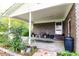 Covered patio area with brick walls and plants at 3657 Highway 472, Conway, SC 29526