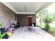 Covered patio with brick walls, storage, and room for bikes at 3657 Highway 472, Conway, SC 29526