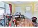 Dining area with wood table and chairs, and back door access at 3657 Highway 472, Conway, SC 29526