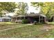 Ranch house with carport, mature trees, and spacious yard at 3657 Highway 472, Conway, SC 29526