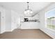 Bright dining area featuring white walls, hanging light fixture, and window at 395 Thistle Ln., Myrtle Beach, SC 29579