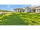 Large backyard with green grass at 409 Sun Colony Blvd., Longs, SC 29568