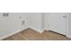 Laundry area with wood-look flooring and washer/dryer hookups at 409 Sun Colony Blvd., Longs, SC 29568