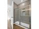 Shower with gray tile, glass door, and modern fixtures at 409 Sun Colony Blvd., Longs, SC 29568