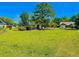 Large vacant lot with a view of neighboring homes at 4090 Lake Shore Dr., Little River, SC 29566