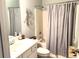 The full bathroom features a tub and shower, with unique mermaid decor adding a whimsical touch at 414 Grand Cypress Way, Murrells Inlet, SC 29576
