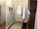 Light-filled entryway featuring hardwood floors, decorative door with glass, and classic decor at 414 Grand Cypress Way, Murrells Inlet, SC 29576