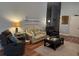 Comfortable living room area with hardwood flooring, neutral colors, and plush seating for relaxing at 414 Grand Cypress Way, Murrells Inlet, SC 29576