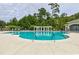 Large community pool with zero entry and lots of mature landscaping at 414 Grand Cypress Way, Murrells Inlet, SC 29576